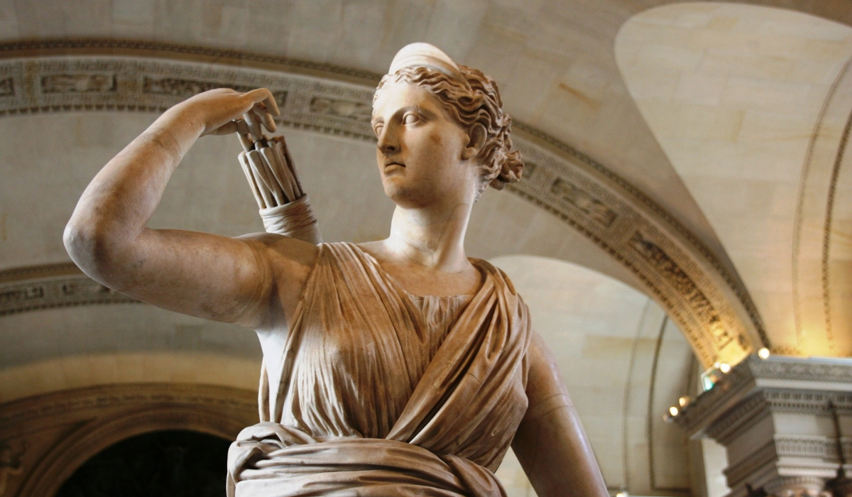 Female statue tan cream stone